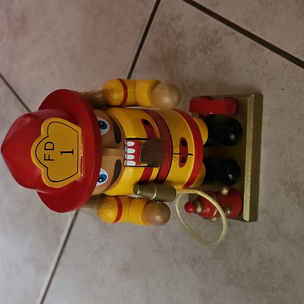 Firefighter Nutcracker Toy - Red and Yellow